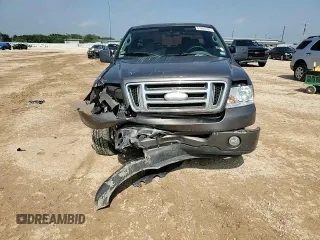 2007 Ford F-150 XL with VIN 1FTRF12247KB92953, listed as a Copart auction lot 61055325 with 79,947 mi miles and Salvage title. Bid and sale history available at DreamBid. Image 13.