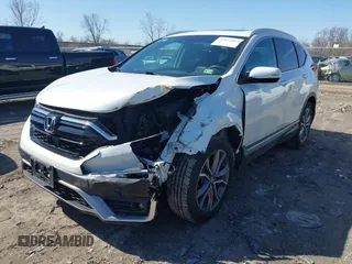 2020 Honda CR-V Touring with VIN 2HKRW2H99LH635892, listed as a IAAI auction lot 41822462 with 41,645 mi miles and . Bid and sale history available at DreamBid. Image 2.