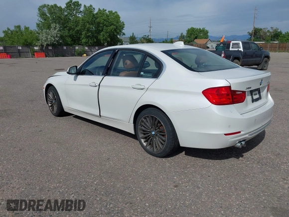 2013 BMW 3 Series 328i xDrive with VIN WBA3B5C52DF599074, listed as a IAAI auction lot 42408547 with 158,050 mi miles and . Bid and sale history available at DreamBid. Image 3.