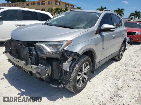 2018 Toyota RAV4 XLE with VIN 2T3WFREV7JW423768, listed as a Copart auction lot 61841875 with 111,991 mi miles and Salvage title. Bid and sale history available at DreamBid. Image 1.