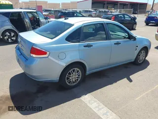 2008 Ford Focus SE with VIN 1FAHP35N28W224406, listed as a IAAI auction lot 41861020 with 127,025 mi miles. Bid and sale history available at carsss.com. Image 4.