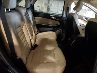 2019 Ford Edge SEL z VIN 2FMPK4J94KBC58905, wystawiony jako Copart lot #52763675 z przebiegiem 100 774 mil mil oraz Szkoda całkowita • Salvage title. Historia ofert i sprzedaży dostępna na DreamBid. Obrazek 11.