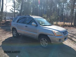 2005 Kia Sportage LX with VIN KNDJF723057130569, listed as a IAAI auction lot 41509247 with 155,777 mi miles and . Bid and sale history available at carsss.com. Image 1.