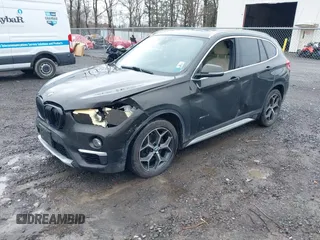 2018 BMW X1 xDrive28i with VIN WBXHT3C34J5K31430, listed as a IAAI auction lot 41954792 with 125,447 mi miles. Bid and sale history available at carsss.com. Image 17.