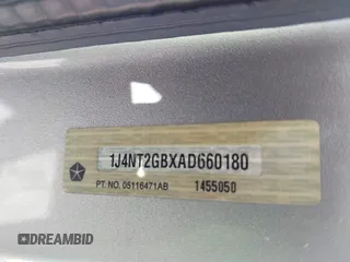 2010 Jeep Patriot Sport with VIN 1J4NT2GBXAD660180, listed as a IAAI auction lot 42146950 with 217,054 mi miles. Bid and sale history available at carsss.com. Image 9.