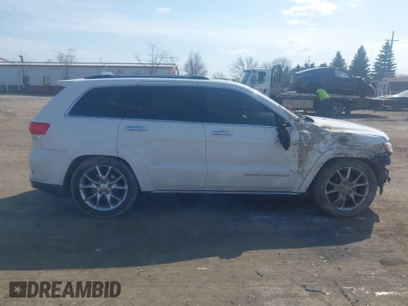 2015 Jeep Grand Cherokee Summit with VIN 1C4RJFJGXFC734025, listed as a IAAI auction lot 41842927 with 137,993 mi miles. Bid and sale history available at carsss.com. Image 13.