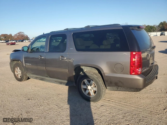 2011 GMC Yukon XL SLT with VIN 1GKS1KE09BR271636, listed as a Copart auction lot 85499874 with 232,705 mi miles and Salvage Title. Bid and sale history available at carsss.com. Image 2.