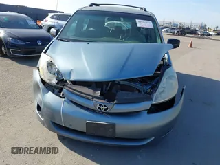 2009 Toyota Sienna CE with VIN 5TDZK23C19S268830, listed as a IAAI auction lot 42032259 with 113,596 mi miles. Bid and sale history available at carsss.com. Image 12.