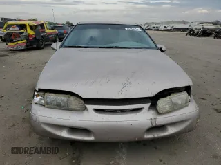 1994 Ford Thunderbird LX with VIN 1FALP6241RH110457, listed as a Copart auction lot 76384254 with 54,653 mi miles and Salvage Title. Bid and sale history available at DreamBid. Image 5.
