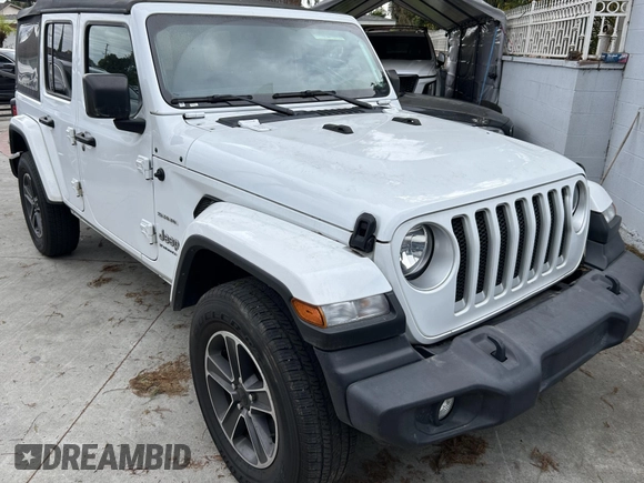 2023 Jeep Wrangler Sahara with VIN 1C4HJXENXPW586579, listed as a IAAI auction lot 41795621 with 34,433 mi miles. Bid and sale history available at carsss.com. Image 1.