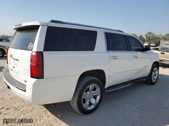 2017 Chevrolet Suburban Premier with VIN 1GNSCJKC7HR128988, listed as a Copart auction lot 73958784 with 121,662 mi miles and Salvage Title. Bid and sale history available at carsss.com. Image 3.