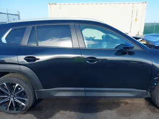 2023 Mazda CX-50 2.5 Turbo with VIN 7MMVABXY9PN154424, listed as a IAAI auction lot 40132755 with 10,620 mi miles. Bid and sale history available at carsss.com. Image 13.