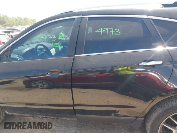 2015 Cadillac SRX Performance Collection with VIN 3GYFNCE30FS549872, listed as a IAAI auction lot 42201529 with 125,128 mi miles and . Bid and sale history available at DreamBid. Image 15.