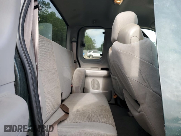 2003 Ford F-150 XL with VIN 1FTRX07WX3KB99581, listed as a Copart auction lot 56907765 with 232,597 mi miles and Salvage title. Bid and sale history available at DreamBid. Image 10.