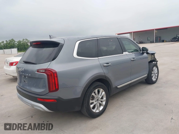 2022 Kia Telluride LX z VIN 5XYP2DHC5NG209265, wystawiony jako IAAI lot #42376957 z przebiegiem 51 615 mil mil oraz . Historia ofert i sprzedaży dostępna na DreamBid. Obrazek 4.