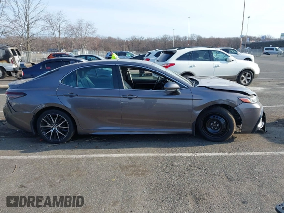 2023 Toyota Camry SE z VIN 4T1G11BK7PU077382, wystawiony jako IAAI lot #41785765 z przebiegiem 34 953 mil mil oraz . Historia ofert i sprzedaży dostępna na DreamBid. Obrazek 13.