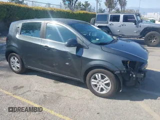 2014 Chevrolet Sonic LT with VIN 1G1JC6SG4E4118781, listed as a IAAI auction lot 41862192 with 124,375 mi miles. Bid and sale history available at carsss.com. Image 1.