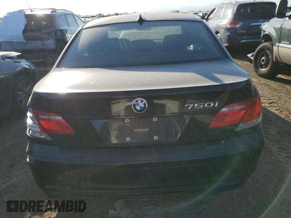 2007 BMW 7 Series 750i with VIN WBAHL83507DT07958, listed as a Copart auction lot 73318944 with 127,698 mi miles and Salvage Title. Bid and sale history available at DreamBid. Image 6.