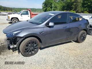2023 Tesla Model Y Long Range z VIN 7SAYGDEE5PF834774, wystawiony jako Copart lot #54426165 z przebiegiem 25 315 mil mil oraz Szkoda całkowita • Salvage title. Historia ofert i sprzedaży dostępna na DreamBid. Obrazek 1.