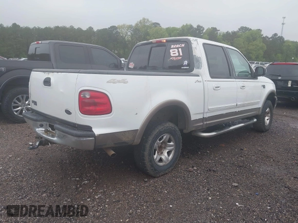 2002 Ford F-150 XLT with VIN 1FTRW08L92KB32427, listed as a IAAI auction lot 41968814 with 325,372 mi miles. Bid and sale history available at carsss.com. Image 4.