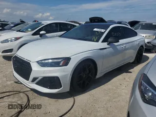 2023 Audi RS 5 Sportback z VIN WUAAWCF55PA900469, wystawiony jako Copart lot #77256674 z przebiegiem 20 575 mil mil oraz Nie do naprawy • Non repairable. Historia ofert i sprzedaży dostępna na DreamBid. Obrazek 1.