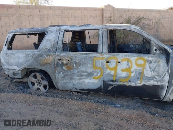 2019 Chevrolet Suburban LT with VIN 1GNSCHKC2KR395939, listed as a IAAI auction lot 41407596 with Not Provided miles and . Bid and sale history available at DreamBid. Image 12.
