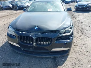2015 BMW 7 Series 750i xDrive with VIN WBAYB6C57FD965802, listed as a IAAI auction lot 40588698 with 999,999 mi miles. Bid and sale history available at carsss.com. Image 10.