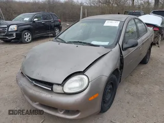 2000 Dodge Neon Highline with VIN 1B3ES46C0YD603464, listed as a IAAI auction lot 41905715 with 176,971 mi miles. Bid and sale history available at carsss.com. Image 2.