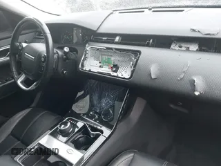 2020 Land Rover Range Rover Velar S z VIN SALYB2EX7LA265410, wystawiony jako IAAI lot #41840054 z przebiegiem 80 795 mil mil oraz . Historia ofert i sprzedaży dostępna na DreamBid. Obrazek 6.