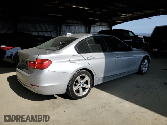 2015 BMW 3 Series 328i with VIN WBA3A5G54FNS91037, listed as a Copart auction lot 61854775 with 119,658 mi miles and Salvage title. Bid and sale history available at DreamBid. Image 3.