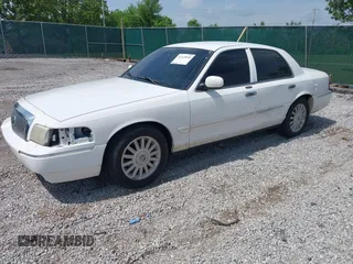 2008 Mercury Grand Marquis LS z VIN 2MEFM75V58X638347, wystawiony jako IAAI lot #42149058 z przebiegiem 115 460 mil mil oraz . Historia ofert i sprzedaży dostępna na DreamBid. Obrazek 2.