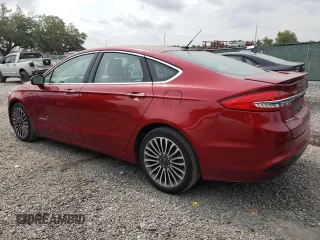 2018 Ford Fusion Titanium with VIN 3FA6P0RU9JR120124, listed as a Copart auction lot 54992384 with 117,170 mi miles and Salvage Title. Bid and sale history available at DreamBid. Image 2.