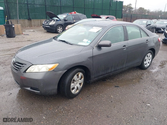 2007 Toyota Camry CE with VIN 4T1BE46K77U688152, listed as a IAAI auction lot 41799406 with 152,033 mi miles. Bid and sale history available at carsss.com. Image 2.