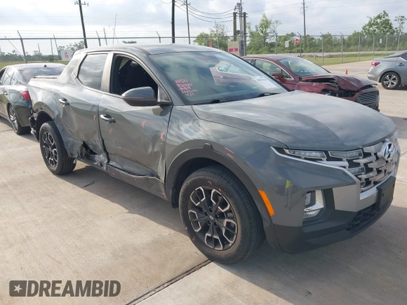 2022 Hyundai Santa Cruz SEL with VIN 5NTJBDAE4NH022823, listed as a IAAI auction lot 42051616 with 23,158 mi miles and . Bid and sale history available at DreamBid. Image 1.