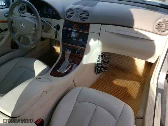 2005 Mercedes-Benz CLK-Class 5.0L with VIN WDBTJ75J05F159477, listed as a Copart auction lot 85168664 with 122,295 mi miles and Salvage Title. Bid and sale history available at carsss.com. Image 8.