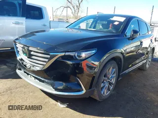 2023 Mazda CX-9 Grand Touring with VIN JM3TCBDY0P0644776, listed as a IAAI auction lot 41488417 with 29,281 mi miles and . Bid and sale history available at carsss.com. Image 17.