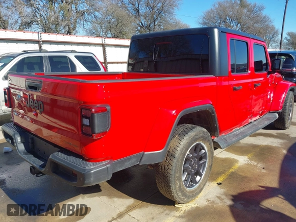 2021 Jeep Gladiator Freedom z VIN 1C6HJTAG7ML609661, wystawiony jako IAAI lot #41410756 z przebiegiem 44 636 mil mil oraz . Historia ofert i sprzedaży dostępna na DreamBid. Obrazek 4.