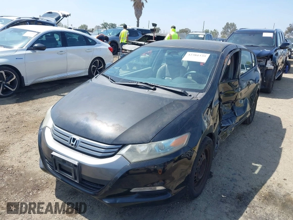 2010 Honda Insight LX with VIN JHMZE2H50AS014165, listed as a IAAI auction lot 42381535 with 169,032 mi miles and . Bid and sale history available at DreamBid. Image 2.