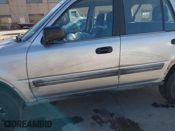 2001 Honda CR-V LX z VIN JHLRD28481S017409, wystawiony jako IAAI lot #41943942 z przebiegiem 134 999 mil mil oraz . Historia ofert i sprzedaży dostępna na DreamBid. Obrazek 17.