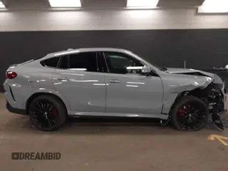 2025 BMW X6 xDrive40i with VIN 5UX33EX04S9Z44291, listed as a IAAI auction lot 41827897 with 1,053 mi miles. Bid and sale history available at carsss.com. Image 13.