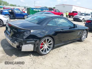 2014 Mercedes-Benz SL 63 AMG z VIN WDDJK7EA3EF029818, wystawiony jako IAAI lot #42123474 z przebiegiem 36 772 mil mil oraz . Historia ofert i sprzedaży dostępna na DreamBid. Obrazek 4.