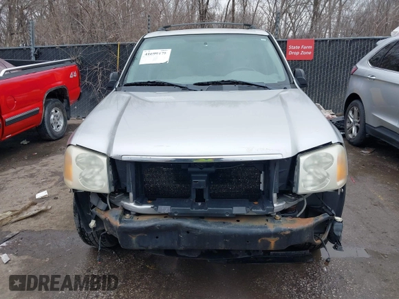 2005 GMC Envoy SLE with VIN 1GKDT13S552332088, listed as a IAAI auction lot 41699178 with 196,869 mi miles. Bid and sale history available at carsss.com. Image 13.