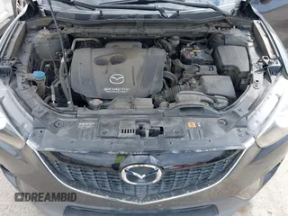 2014 Mazda CX-5 Grand Touring with VIN JM3KE2DY0E0354220, listed as a IAAI auction lot 41885502 with 168,901 mi miles. Bid and sale history available at carsss.com. Image 10.