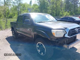 2014 Toyota Tacoma PreRunner z VIN 3TMJU4GN3EM173436, wystawiony jako IAAI lot #41981293 z przebiegiem 157 758 mil mil oraz . Historia ofert i sprzedaży dostępna na DreamBid. Obrazek 1.