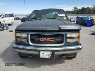 1995 GMC Sierra 1500 z VIN 2GTEK19K1S1561454, wystawiony jako Copart lot #47128465 z przebiegiem 178 963 mil mil oraz Szkody całkowita. Historia ofert i sprzedaży dostępna na DreamBid. Obrazek 5.