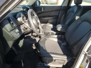 2019 MINI Countryman Cooper with VIN WMZYV5C57K3F57419, listed as a Copart auction lot 38755424 with 84,581 mi miles and Salvage Title. Bid and sale history available at carsss.com. Image 7.