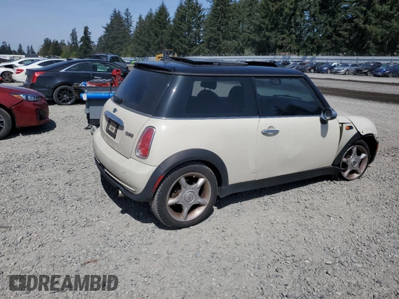 2006 MINI Hardtop with VIN WMWRC33586TJ77908, listed as a Copart auction lot 55095525 with 143,810 mi miles and Salvage title. Bid and sale history available at DreamBid. Image 3.