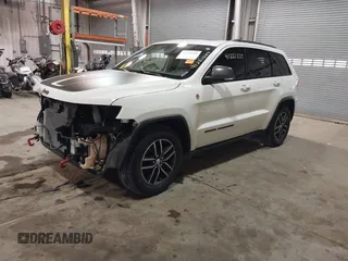 2018 Jeep Grand Cherokee Trailhawk with VIN 1C4RJFLG8JC267810, listed as a IAAI auction lot 41221229 with 108,228 mi miles and . Bid and sale history available at DreamBid. Image 20.