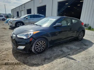 2013 Hyundai Veloster w/Gray Int с VIN KMHTC6AD2DU107229, выставлен на аукционе Copart как лот 64267445 с пробегом 92 859 миль миль и Списание • Salvage title. История ставок и продаж доступна на DreamBid. Изображение 1.