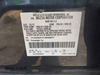2012 Mazda 6 i Touring with VIN 1YVHZ8DH7C5M29077, listed as a IAAI auction lot 42236370 with 193,258 mi miles and . Bid and sale history available at DreamBid. Image 9.